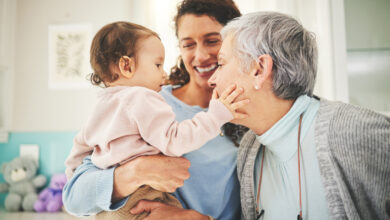 Grandmother, mother and baby in home for playing, quality time and bonding together in living room. Love, happy family and mom carrying child with grandma play for loving, affection and happiness