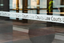 View of sign of the Law Courts, Sydney, Australia