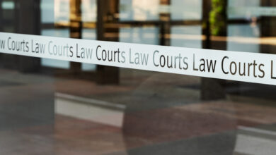 View of sign of the Law Courts, Sydney, Australia
