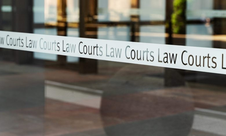 View of sign of the Law Courts, Sydney, Australia