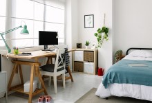 Cozy interior teenage person room with bed and desk