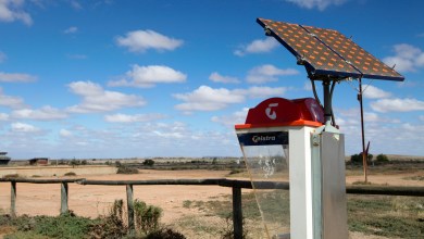 "South Australia, Australia - 12th, May 2012 : Australian Telstra public phone in the outback town of Olary with a solar panel, some areas of Australia mobile phones have no signal."