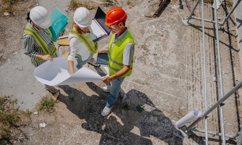 Checking the building construction status by management team