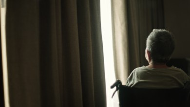 Asian elderly woman on wheelchair.